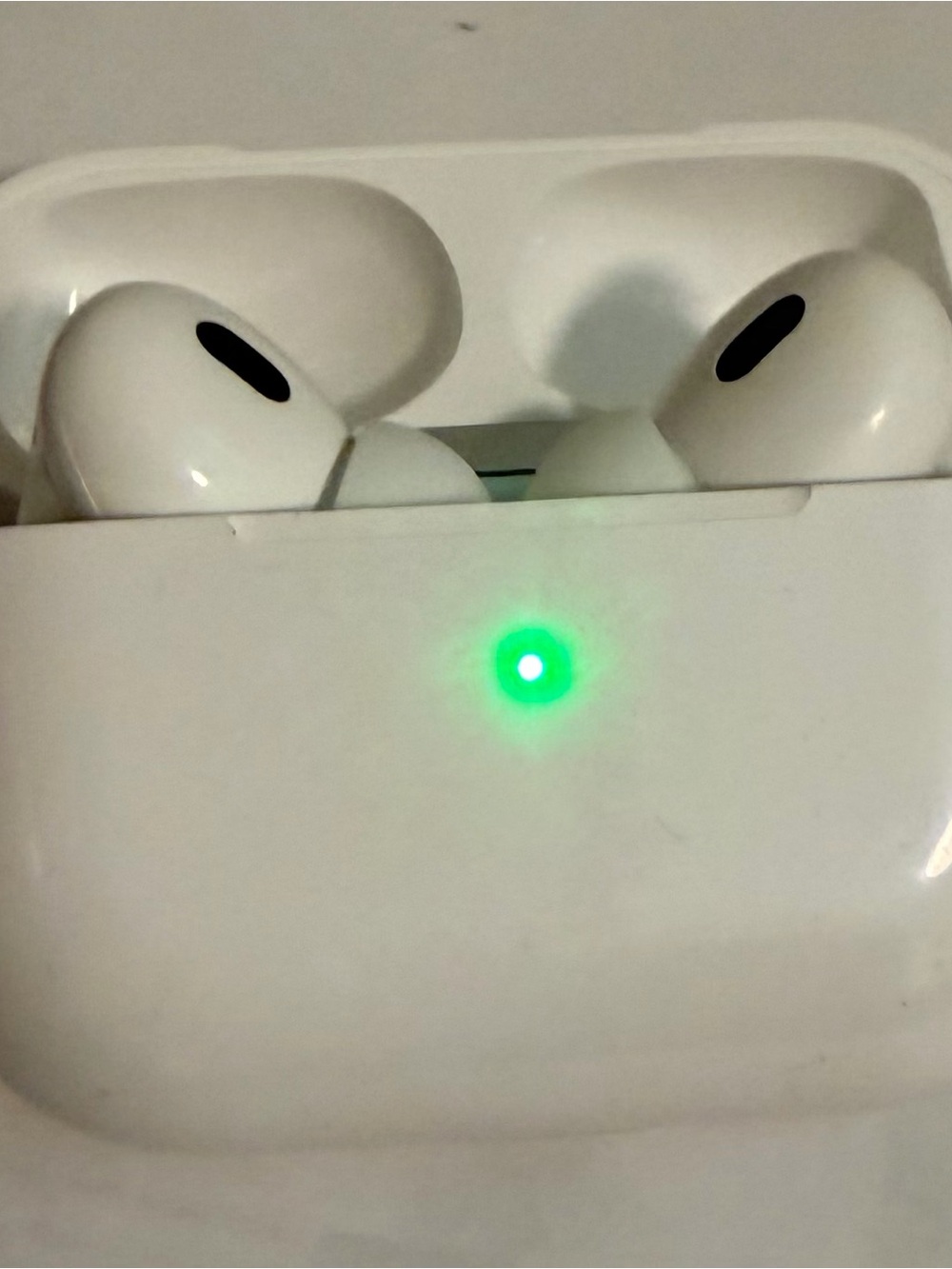 Apple White Wireless Earbuds with Green LED Indicator
